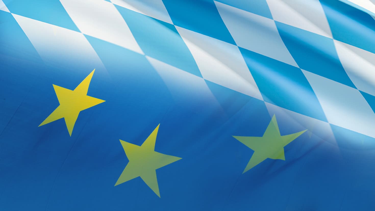 Die Flaggen des Freistaats Bayern (oben) und der Europäischen Union (unten).